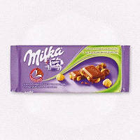 Шоколад Милка молочный цельный орех Крафт, 90 г.